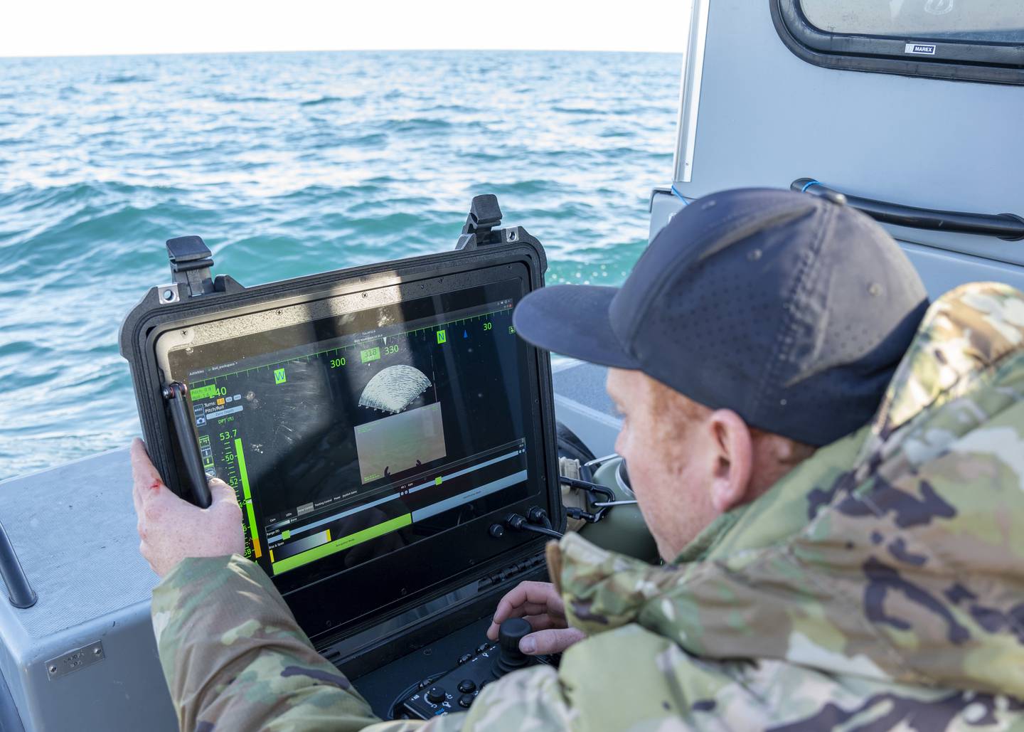 A sailor conducts a search for debris with an underwater vehicle during recovery efforts of a high altitude balloon in the Atlantic Ocean, Feb. 7, 2023.